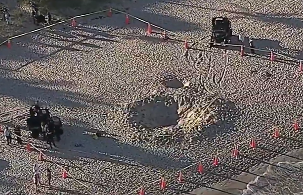 Aerial view of Lauderdale-by-the-Sea beach sand hole where children were trapped, Feb. 20, 2024