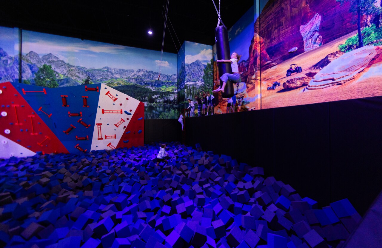 Rock-climbing wall with a foam pit
