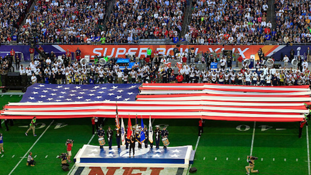 Governor asks everyone stand for anthem before Super Bowl, even those watching at home