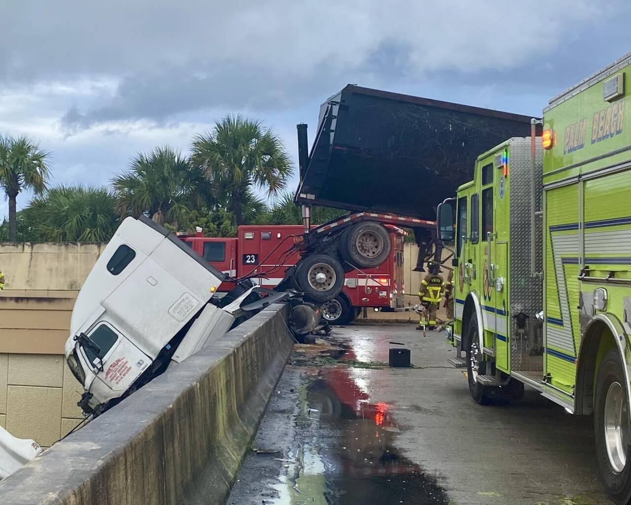 PBCFR on the scene of truck dangling over Beeline Overpass at Florida's Turnpike. Dec. 23, 2023.jpg