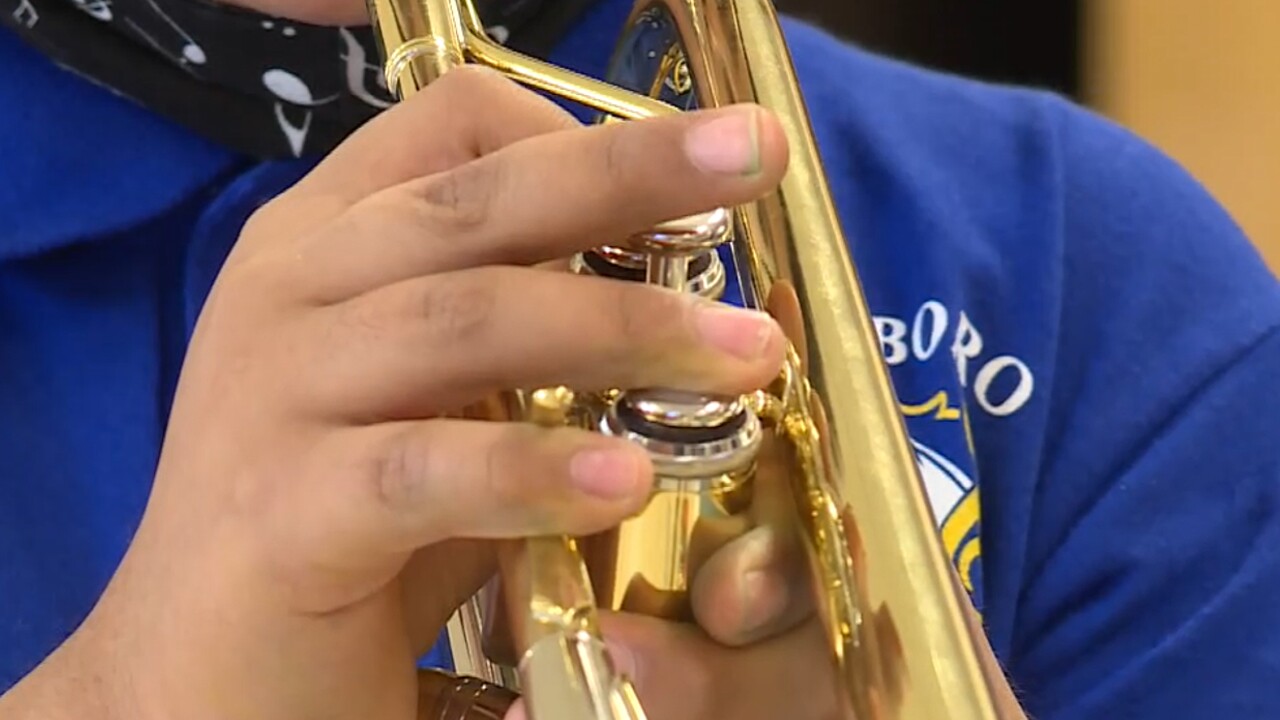 A student plays a trumpet in music class at Northboro Elementary School in West Palm Beach on March 1, 2022.jpg