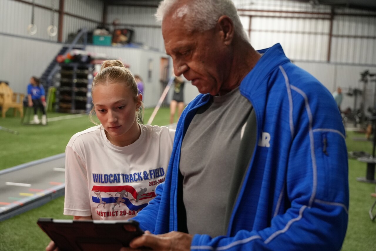 Kevin Hall training pole vaulter Bailey Mitchell