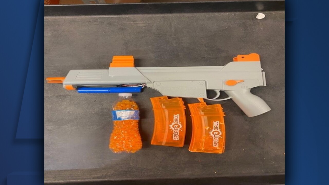 Ethan Liming toy gun.jpg