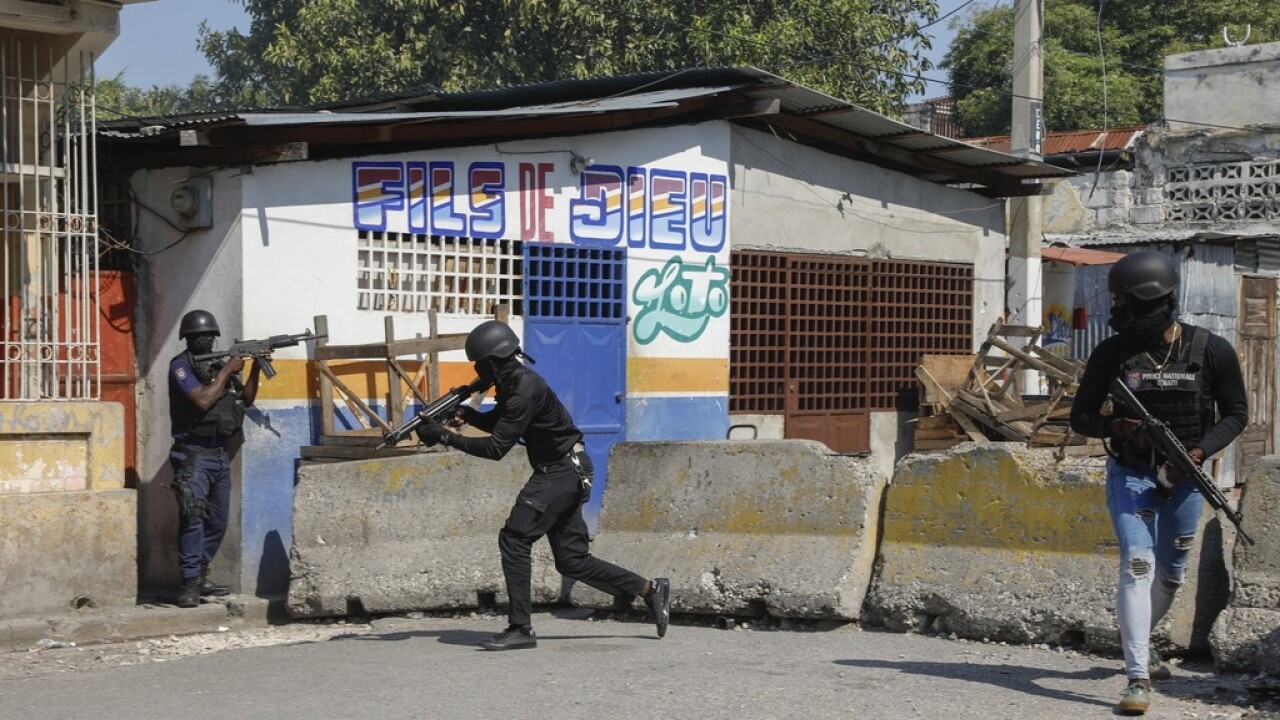 National Police patrol the area near the empty National Penitentiary after a small fire inside the jail.