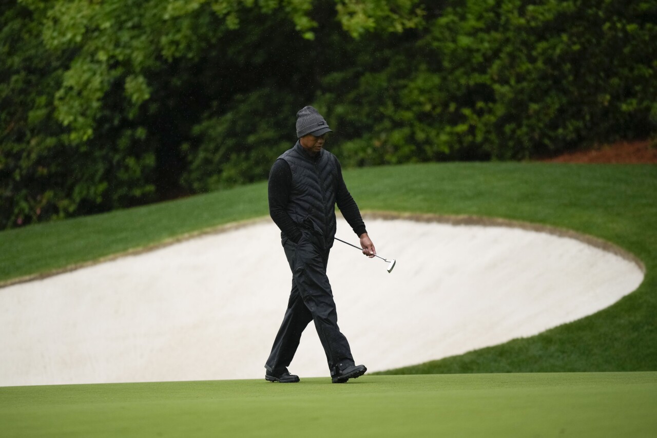 Tiger Woods walks on 13th hole of weather-delayed third round of Masters, April 8, 2023