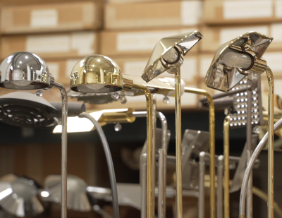 Several Cedric Hartman luminaires, inside his Omaha workshop studio.
