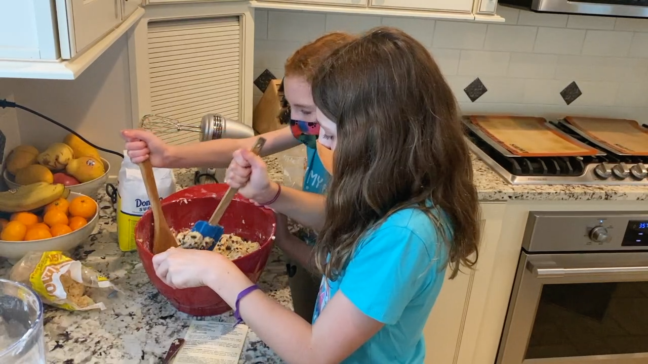Baker Girls Baking cookies.png