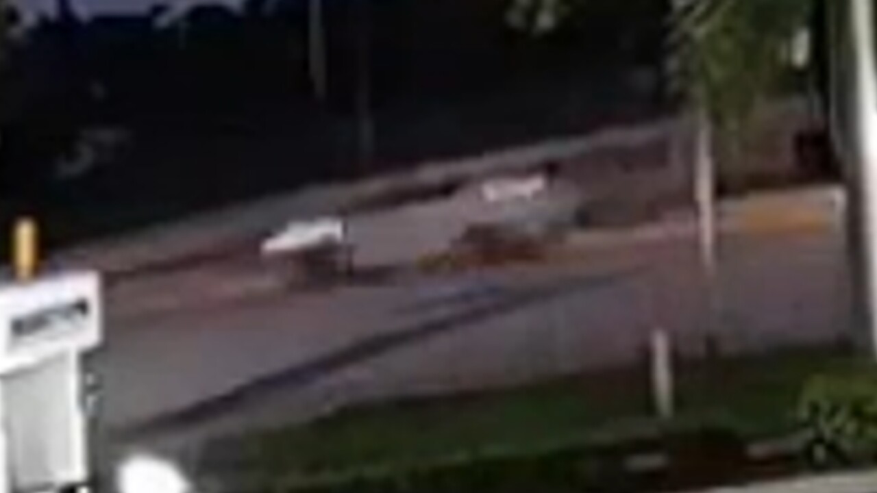 Surveillance image of a Nissan Rogue involved in a fatal hit-and-run crash in the 2300 block of Glades Road in Boca Raton on August 3, 2022.jpg
