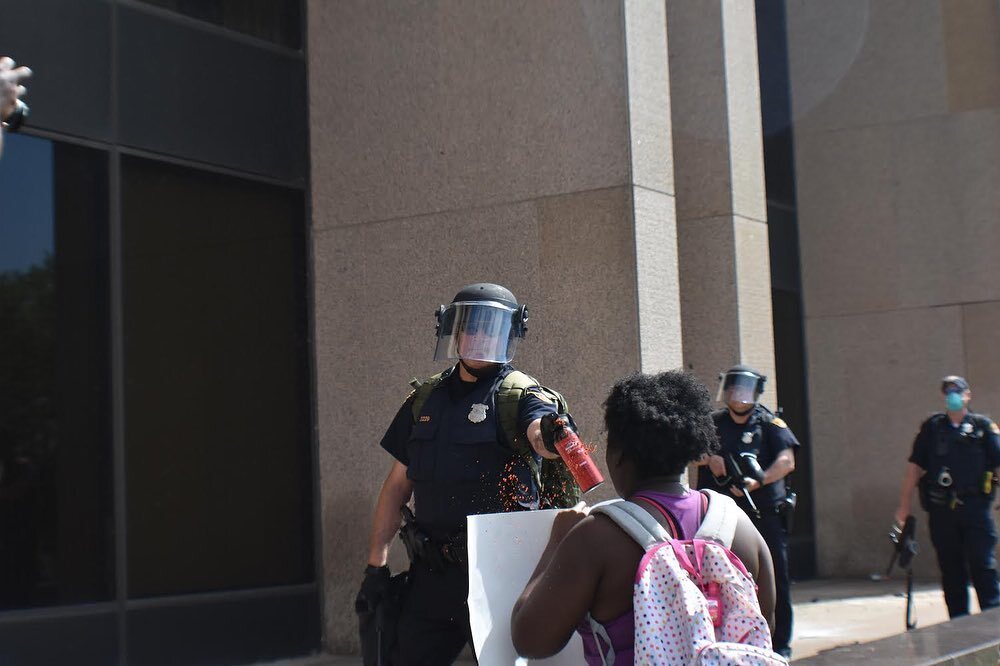 Protestor hit with pepper spray