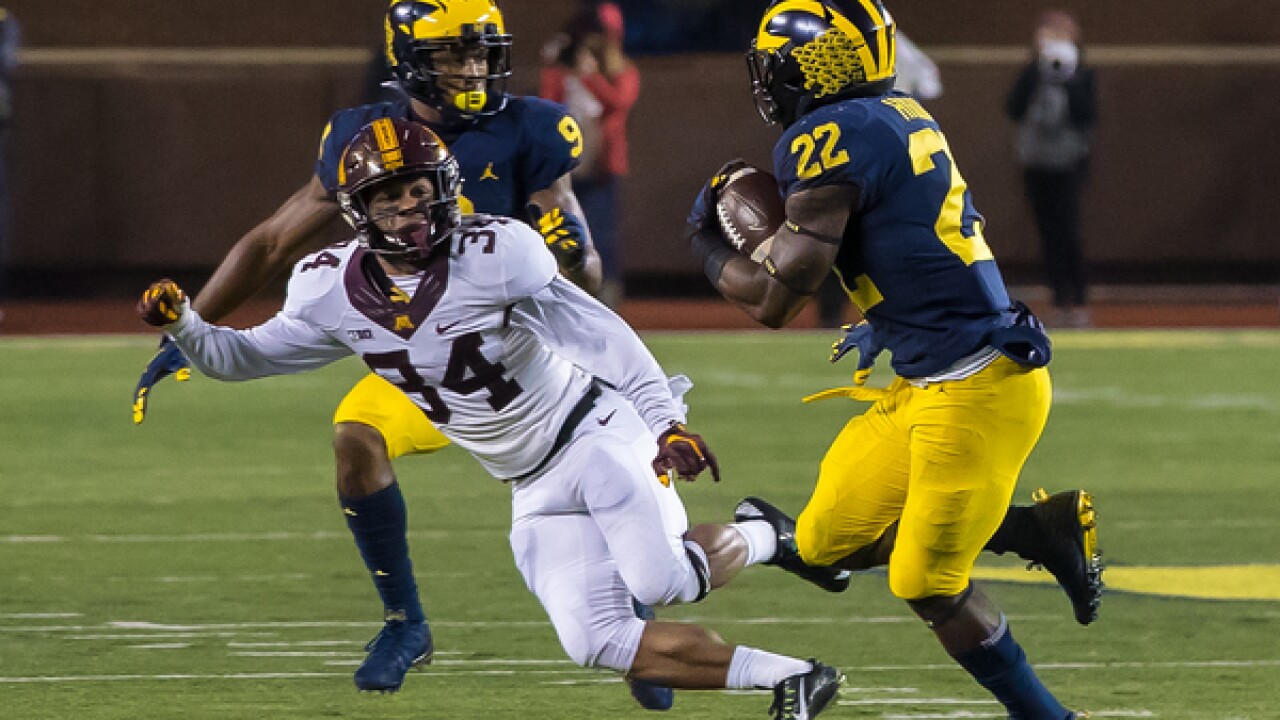 Higdon Evans Rush For 2 Td Each In Michigan Win Over Minnesota