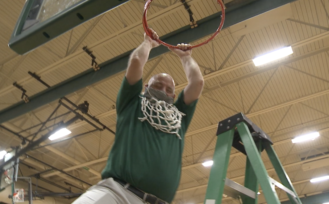 Nate Burns celebrates the conference crown