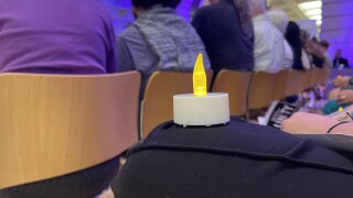 Norfolk candlelight vigil honors domestic violence victims and survivors