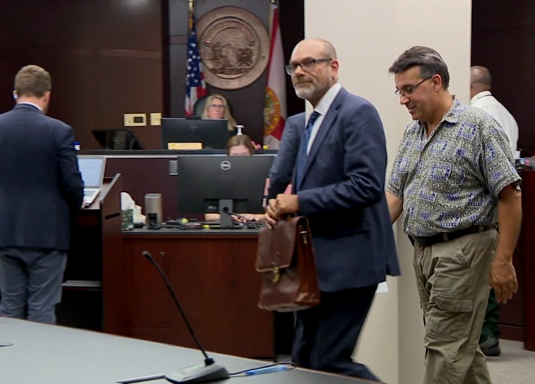 Maximo Sanchez and his attorney smile as they leave court with a Pretrial Intervention Deal on a Felony Littering charge