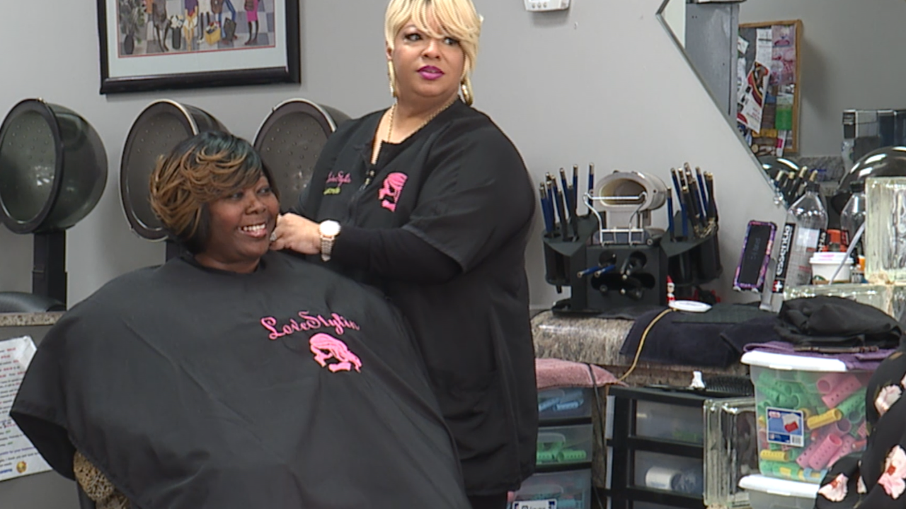 despite taking hit during shutdown hair salon helps furloughed workers