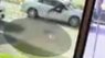 WATCH: Woman leaps onto moving car trying to stop thief