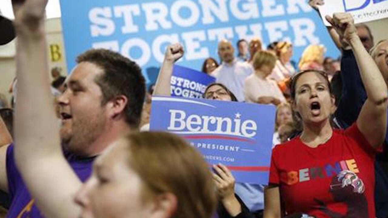 Sanders calls for backers to vote for Clinton