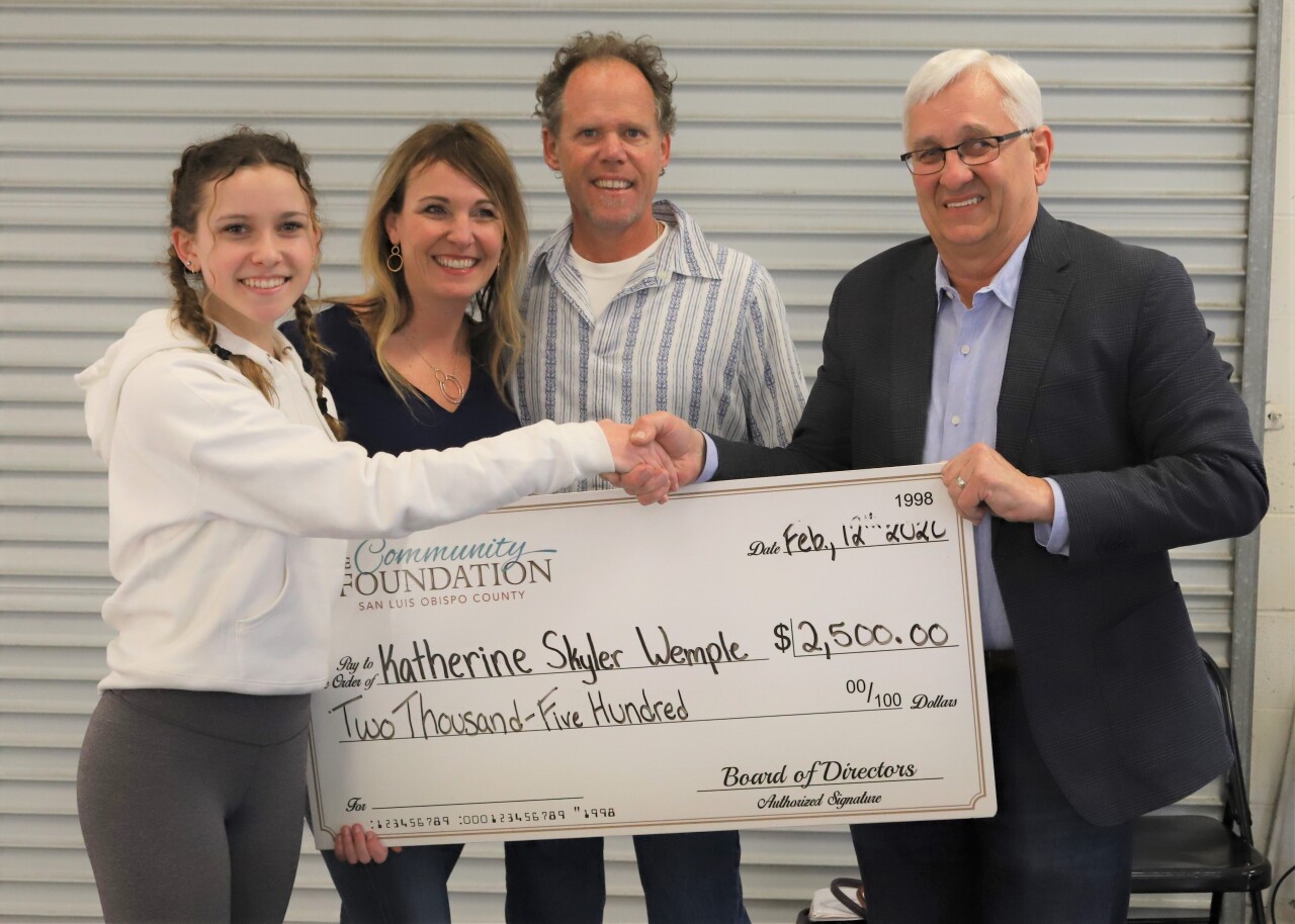 Bill Thoma shaking hands with Skyler Wemple and parents 2-12-20.jpg
