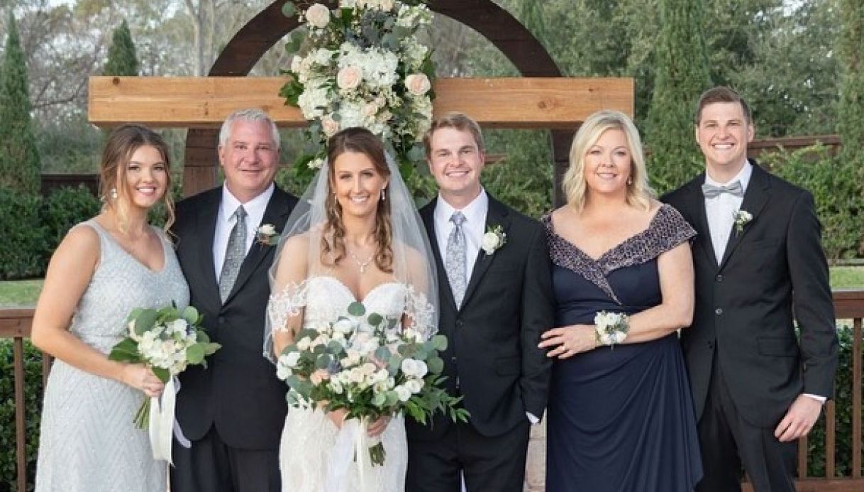 Rob (second from left) and Pam (second from right) died in a crash of a small plane near Billings on September 26, 2021. Their son Riley (far right) was seriously injured.