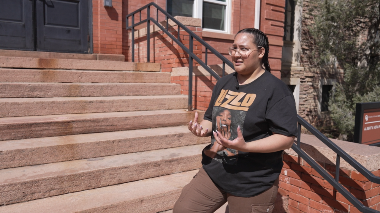 Gabby Mejia stands outside of TB-1 on CU Boulder campus