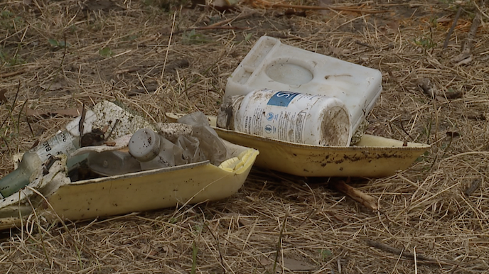 trash by missouri river.png
