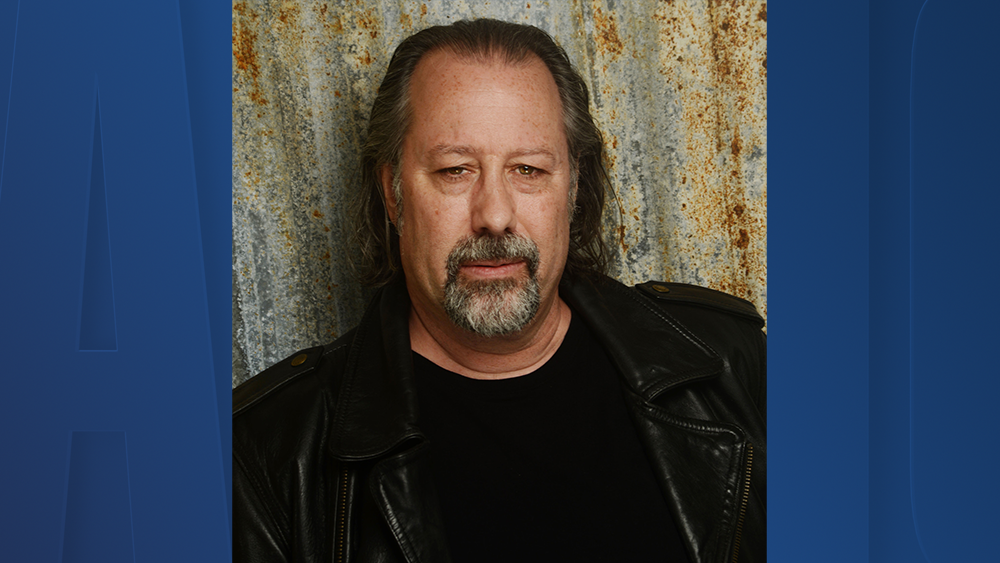 john-carroll-headshot-adam-walser.png