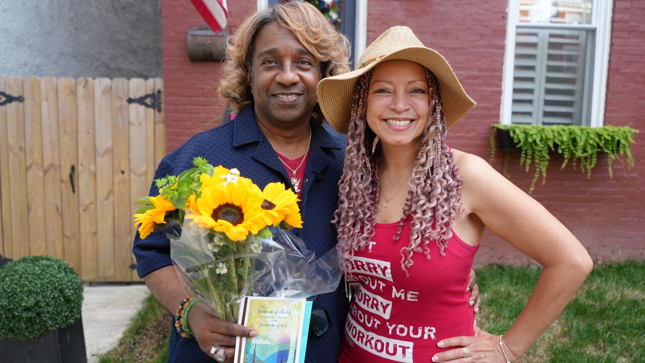 Chip and Jiri outside of her house