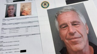 FILE - Documents that were included in the U.S. Department of Justice release of the Jeffrey Epstein files are photographed on Jan. 2, 2026.