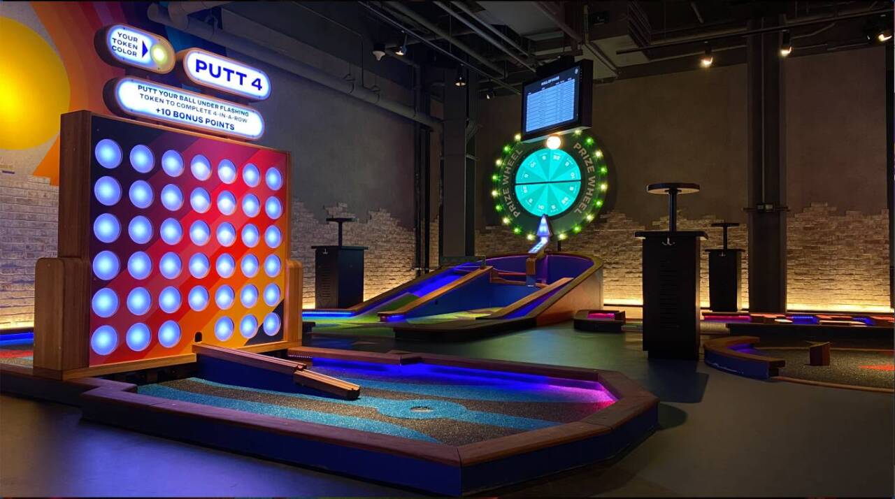 Small tables are located next to the player's play area so they can place their items/drinks there.