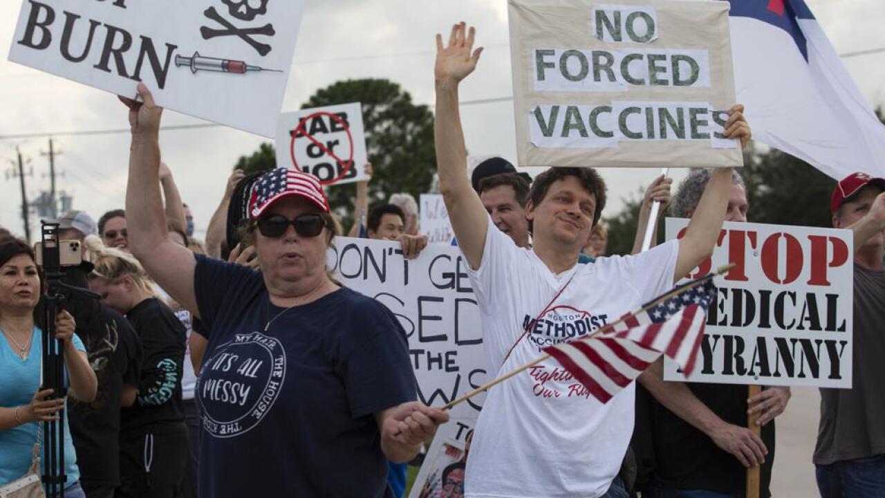 Workers push back against hospitals requiring COVID vaccines