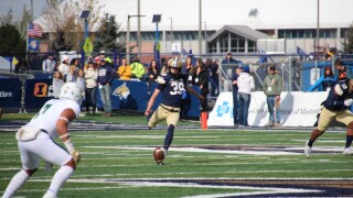 Blake Glessner kicks off the ball to start the game