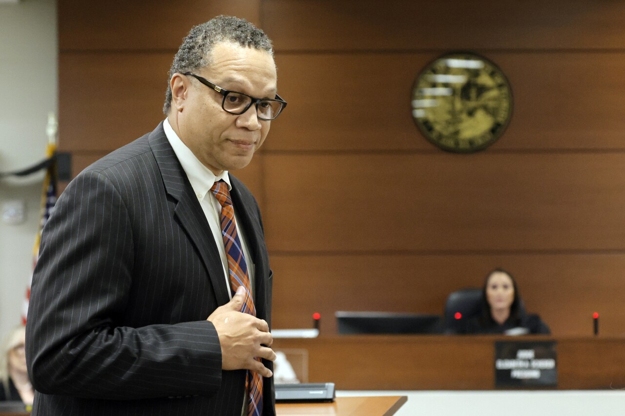 Broward County Public Defender walks away from podium after Judge Elizabeth Scherer dismisses him, Nov. 1, 2022
