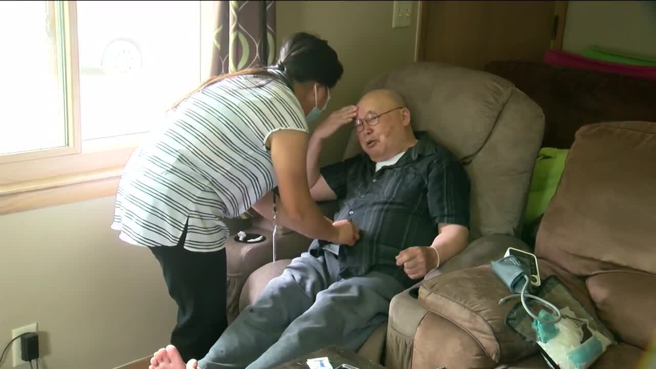 Sia Xiong and a patient.