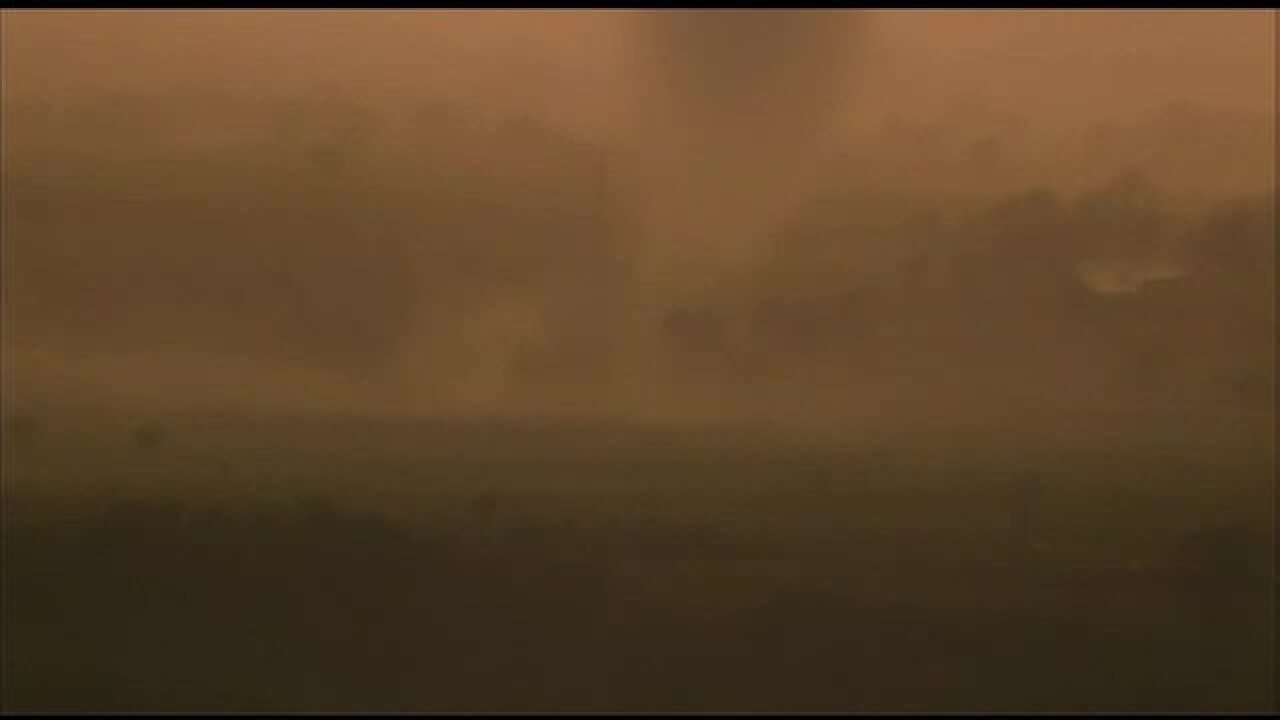 PHOTOS: Tornado forms, touches down