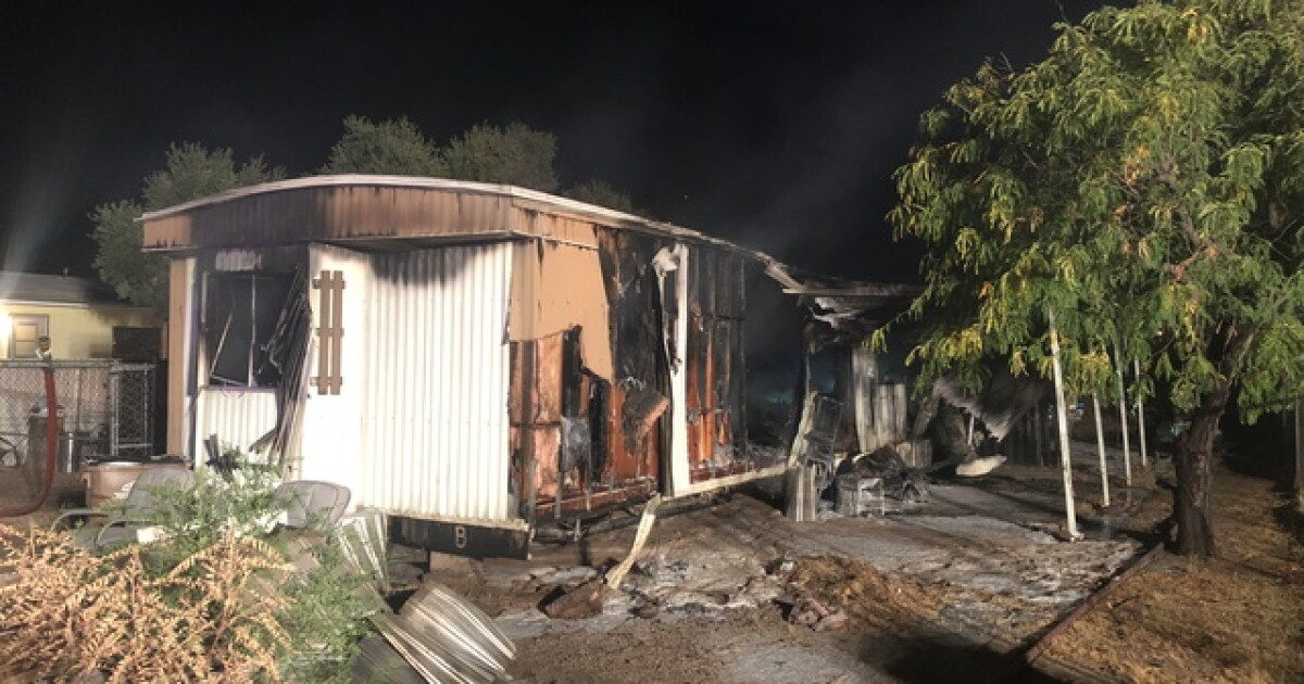 Crews battle mobile home fire on Northwest side