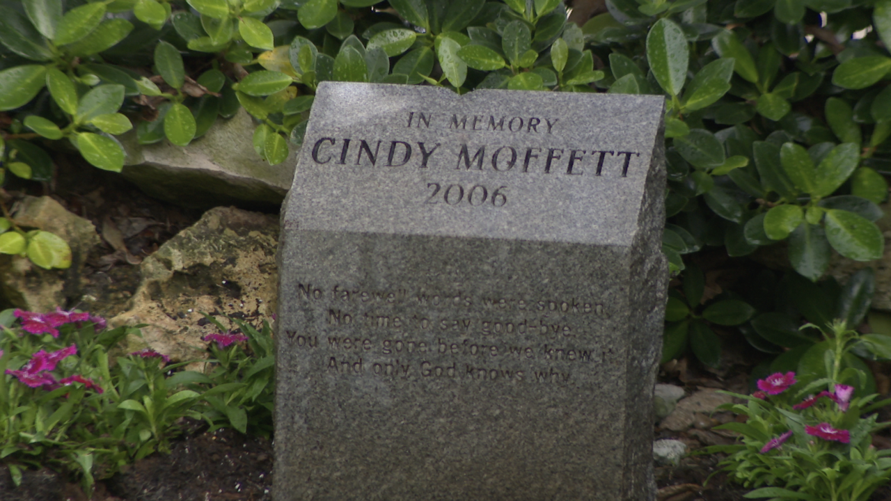 'In Memory Cindy Moffett 2006' grave marker in backyard of Debbie Moffett's home