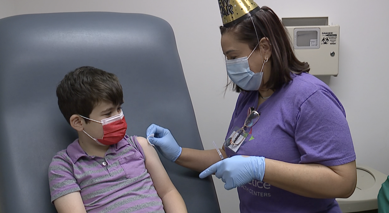 6-year-old Lincoln Lane prepares to receive first dose of COVID-19 vaccine