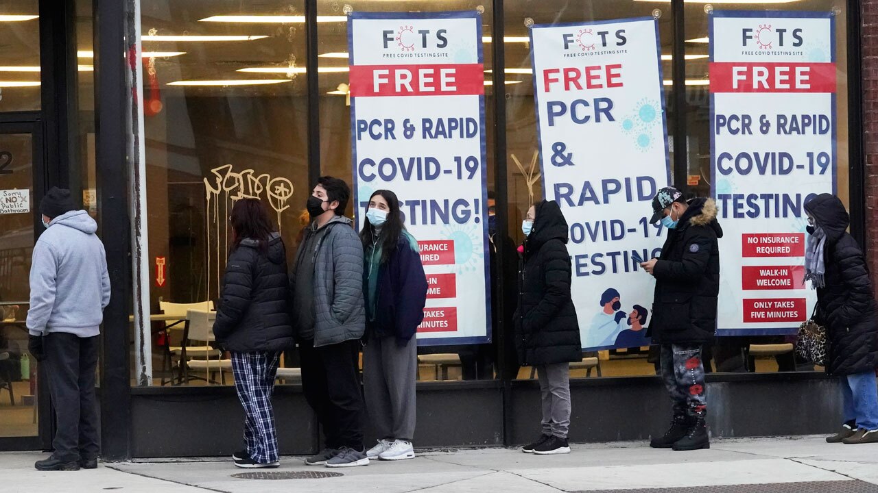 Chicago residents wait in line for COVID tests, Dec. 30, 2021