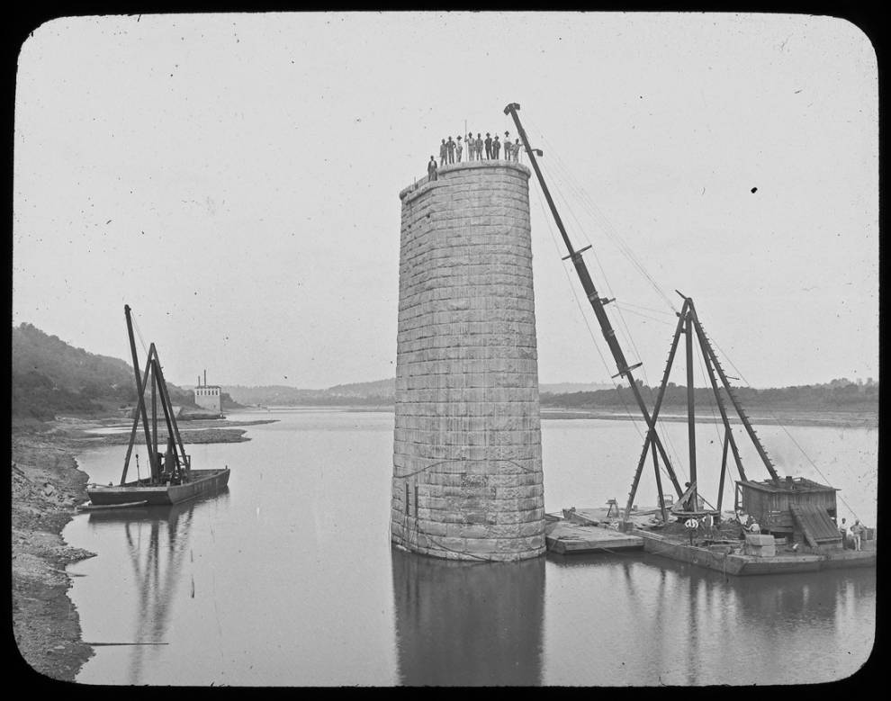 Crews installed the top of a pier at the water intake and pump station on the Ohio River. The facility on Kellogg Avenue opened in 1907.