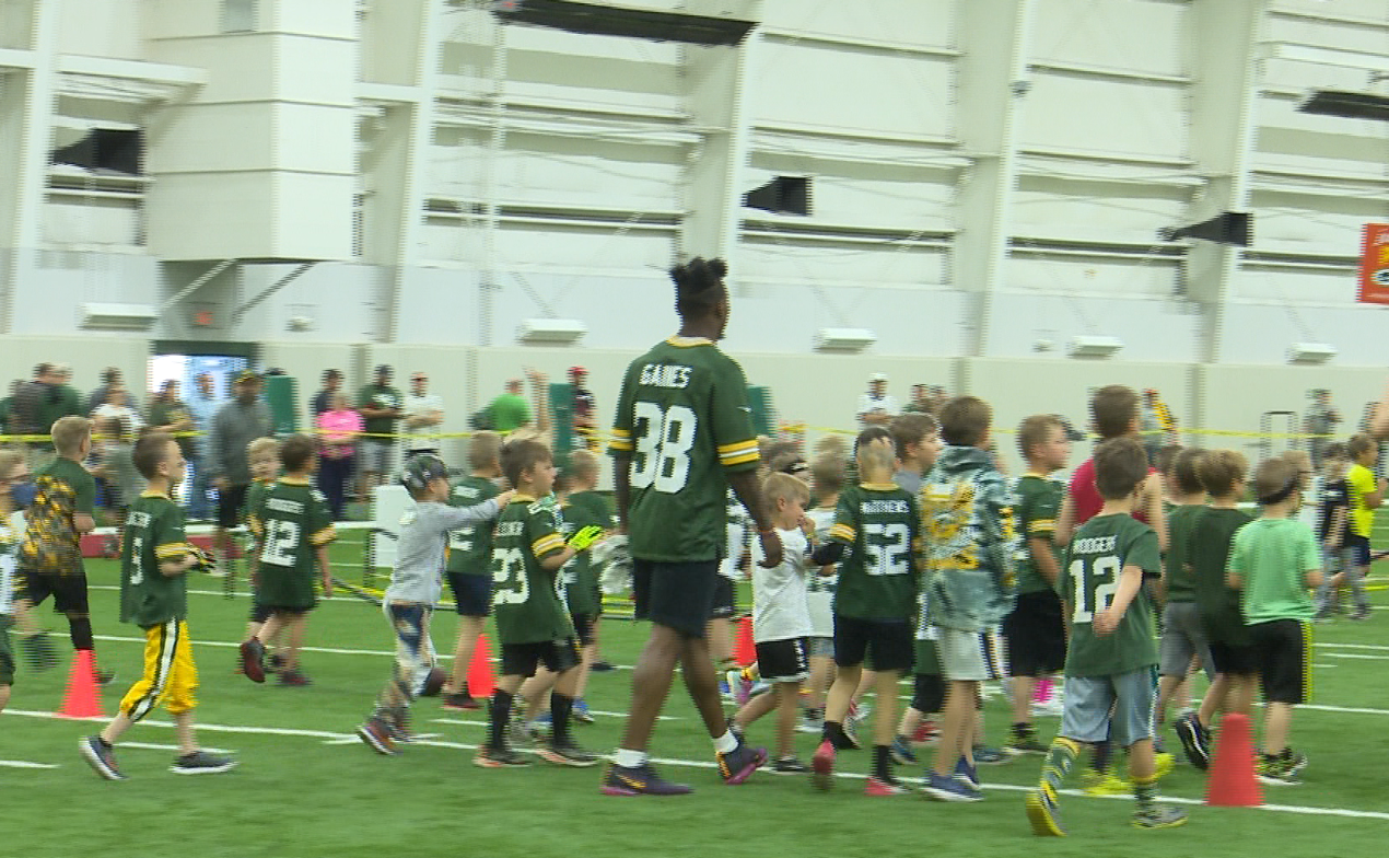 23rd Annual Junior Power Pack Kids Clinic: Packers players coach children on football skills