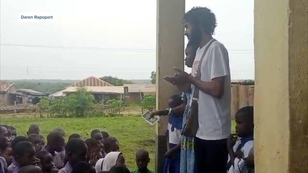 Daren Rapoport teaching the children in Nigeria.