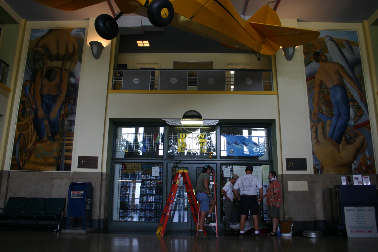Carl Fox rescued the original Gruen clock from trash at the Lunken Airport Terminal and returned the restored timepiece in 2005.