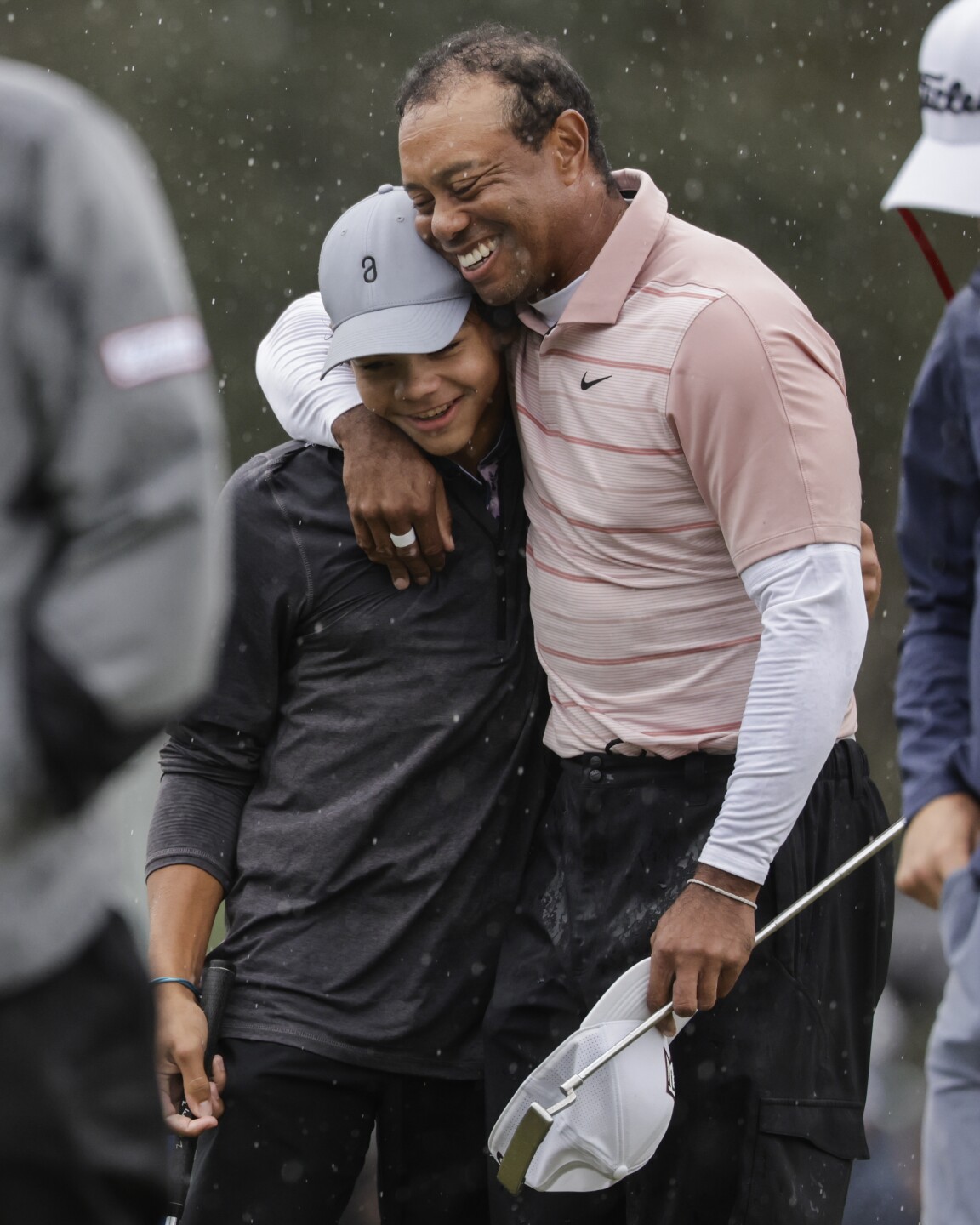 Tiger Woods hugs son Charlie at PNC Championship, Dec. 16, 2023