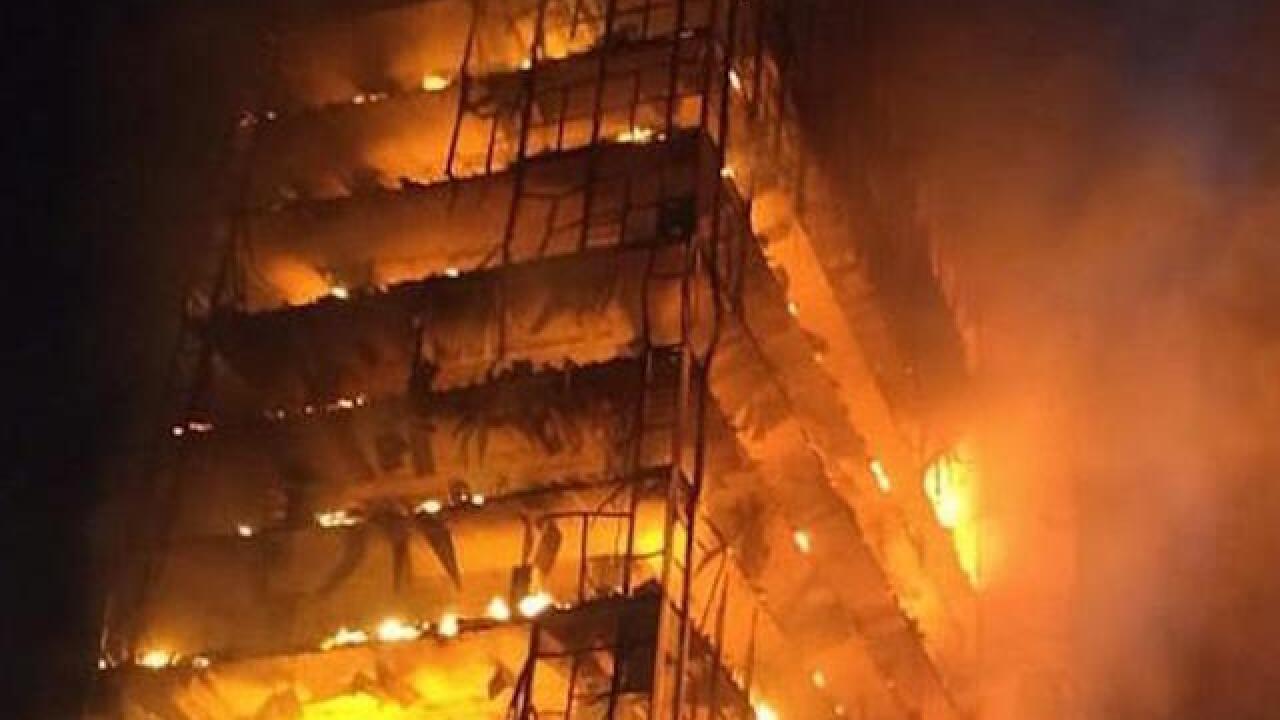 one confirmed dead after huge fire engulfs high rise in brazil