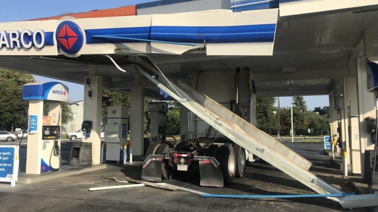 Big rig crashes into ARCO gas station causing structural damage