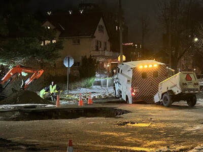 Water truck stuck in sinkhole