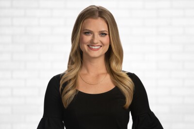 Maggie Bryan (Brick BG).jpg