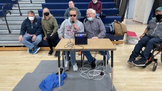 Terry Halstead takes mic for Special Olympics basketball games