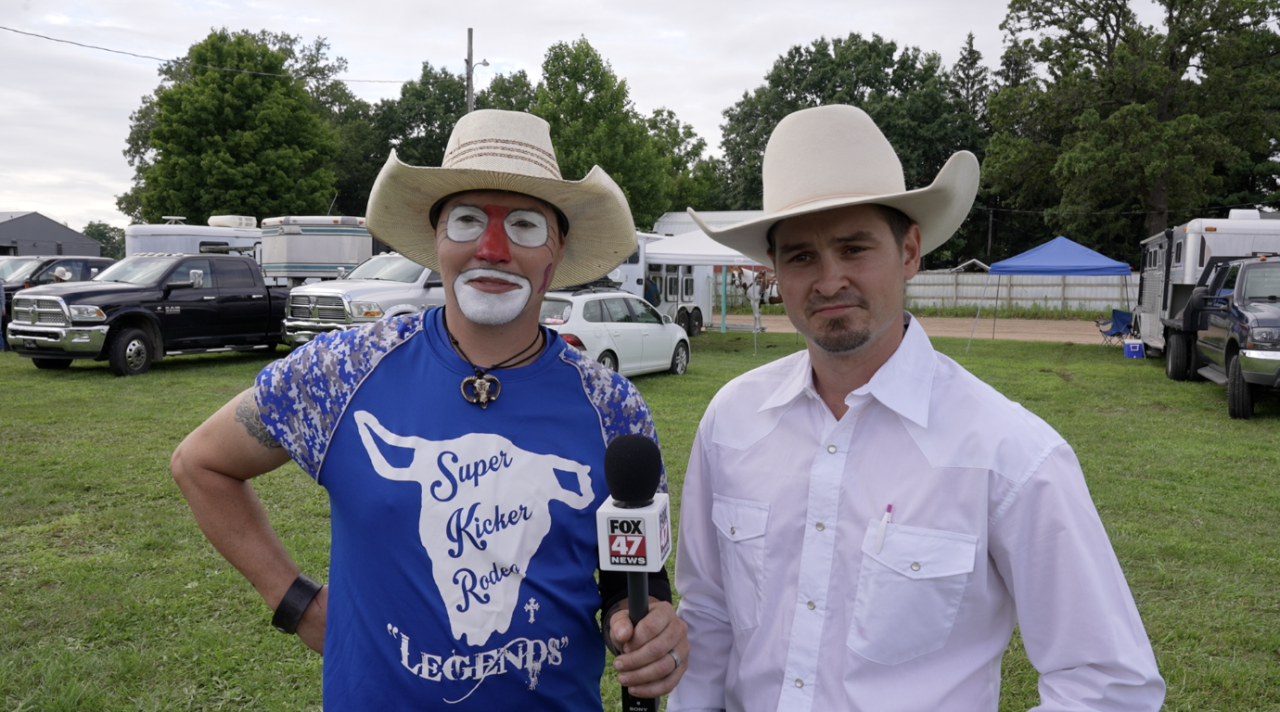 The rodeo clown and announcer