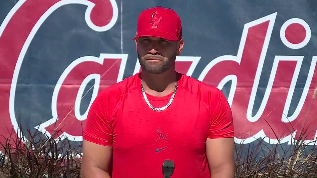 Albert Pujols listens to question from reporter at Roger Dean Chevrolet Stadium, March 28, 2022