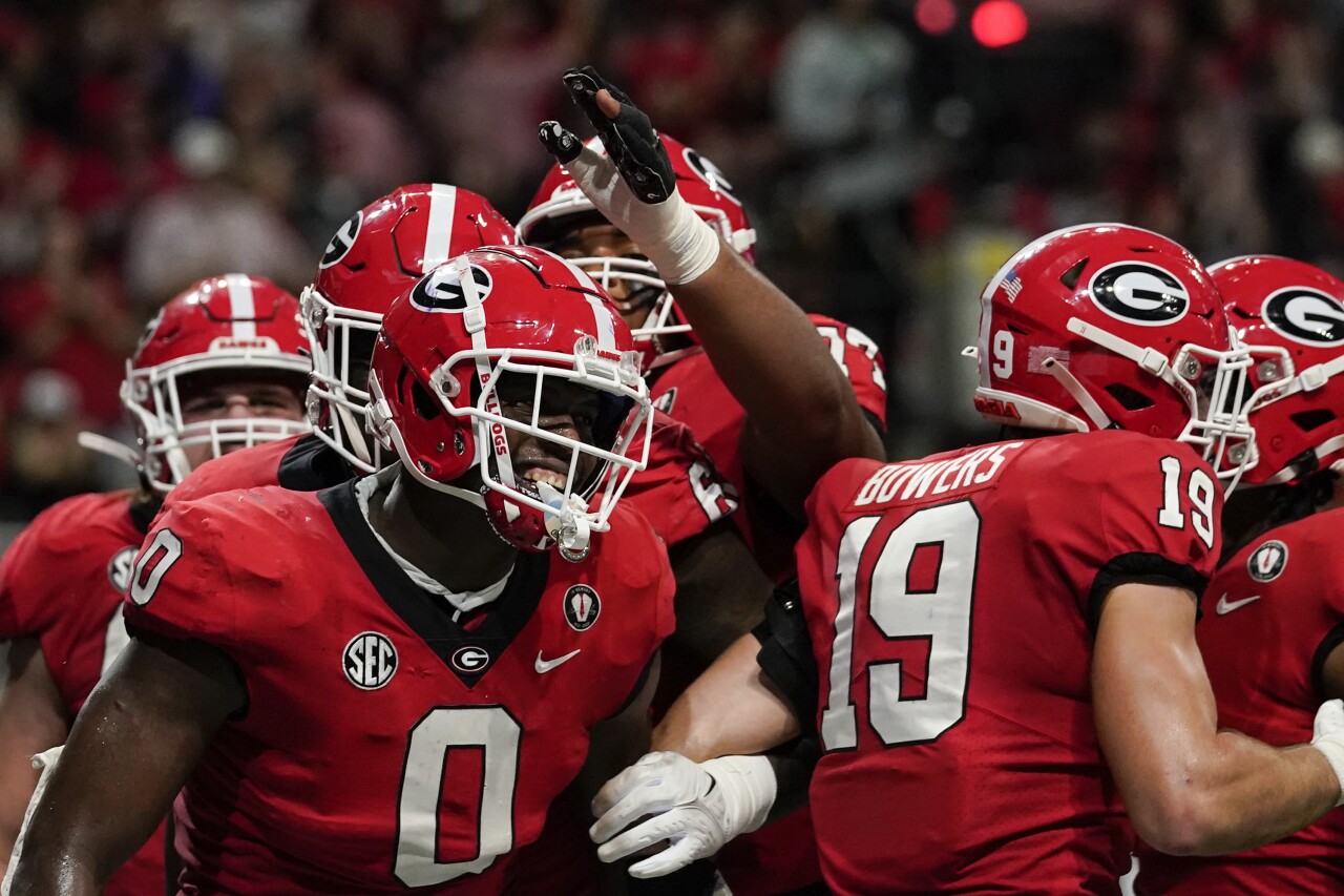 Georgia tight end Darnell Washington celebrates after scoring touchdown in first half of 2022 Southeastern Conference Championship